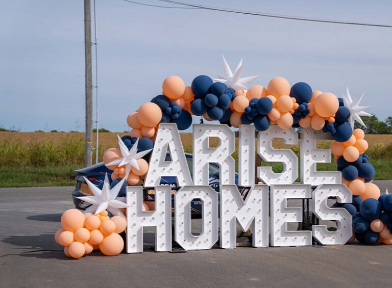 Arise Homes Balloon Sign Event