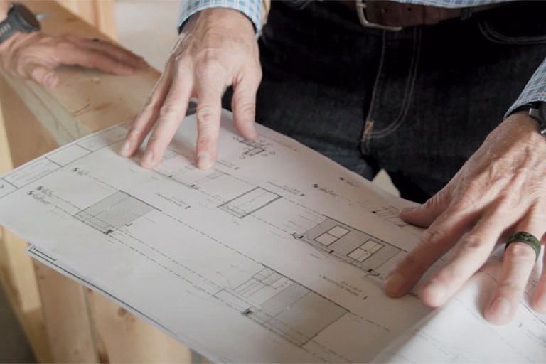 Reviewing Construction Blueprints On Site Plans
